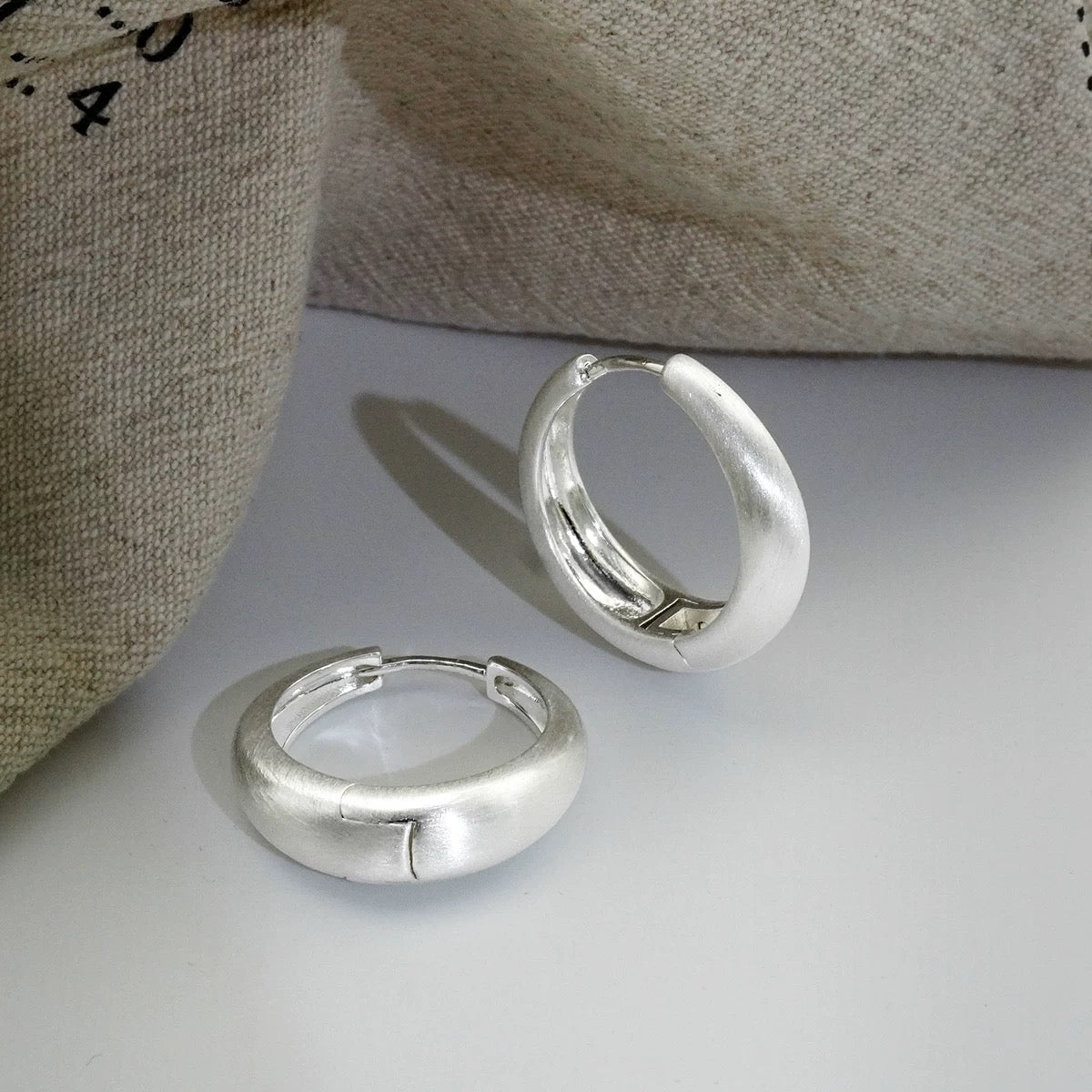 Simply elegant earrings designed set with hoop shape