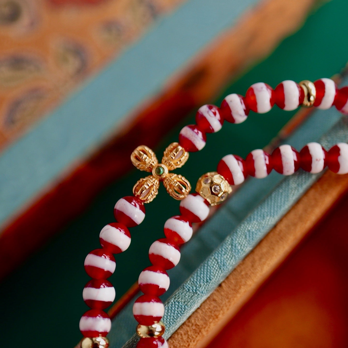 A bracelet made of natural red- meat medicine buddha dzi beads