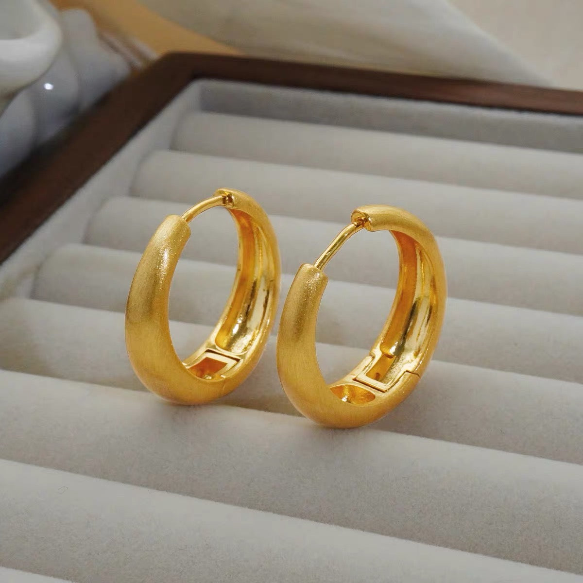 Simply elegant earrings designed set with hoop shape