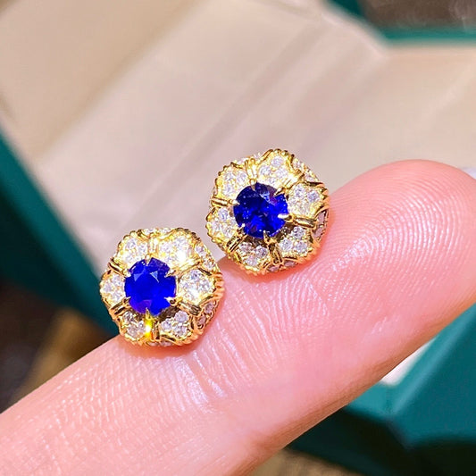 Natural sapphire earring with graceful design and royal blue color